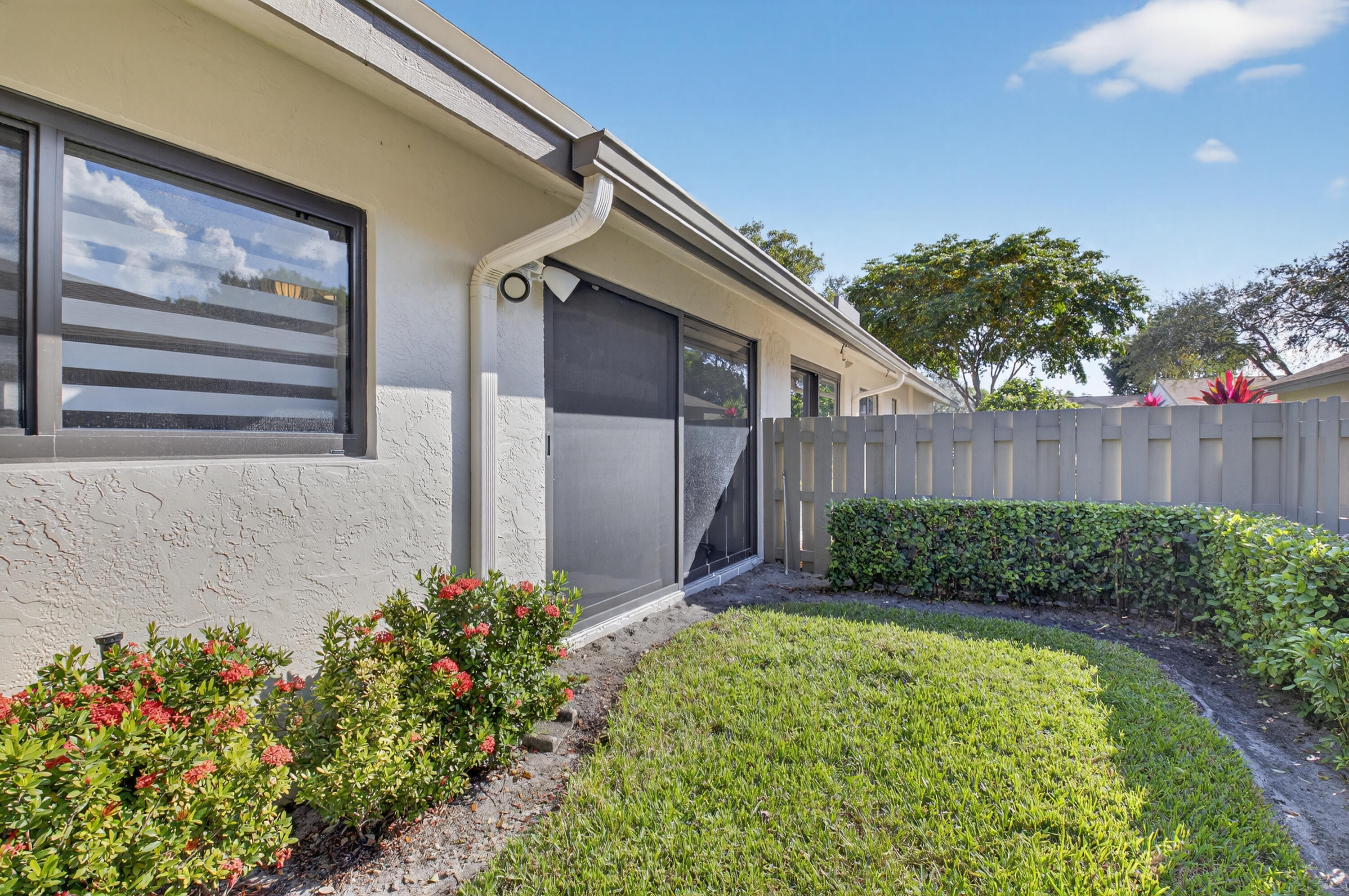 8136 Whispering Palm Drive, Unit B Boca Raton, FL 33496 - Photo 26 of 37 a view of a backyard