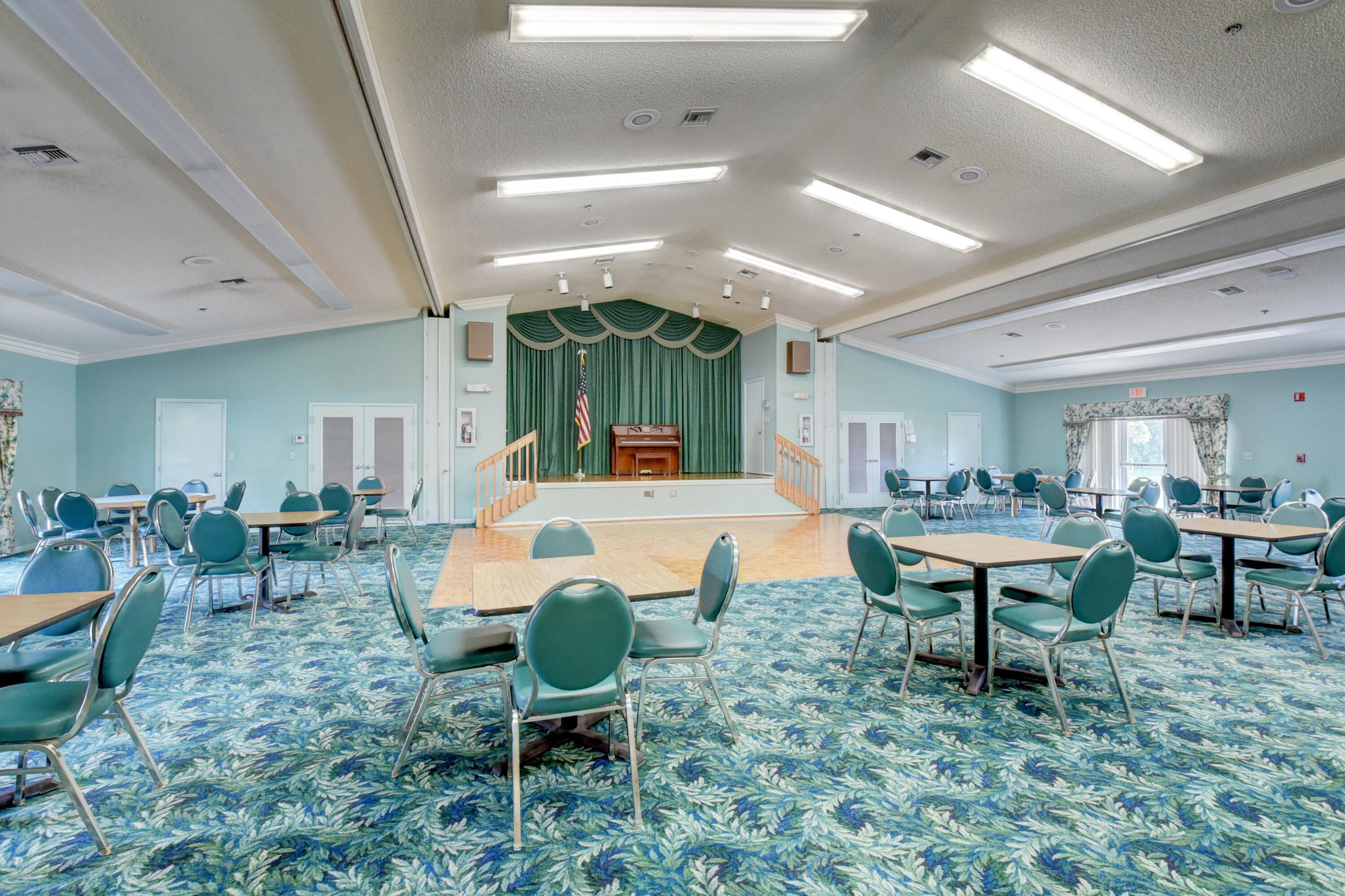 8136 Whispering Palm Drive, Unit B Boca Raton, FL 33496 - Photo 32 of 37 a living room with furniture a rug and a window