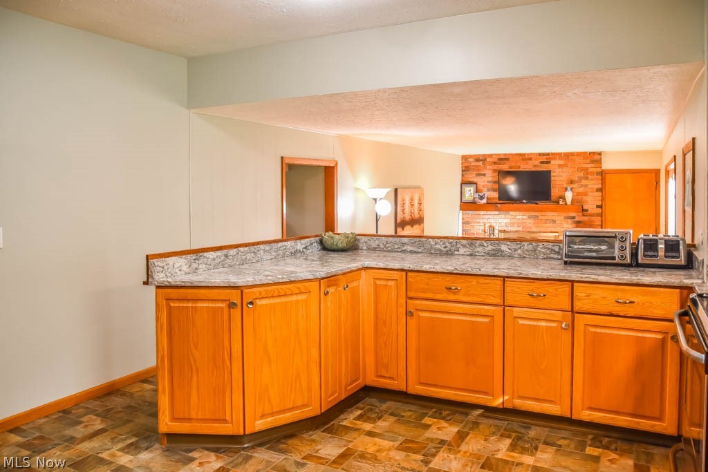 4715 Christman Road Akron, OH 44319 - Photo 5 of 24 The kitchen opens to the family room so the chef is always a part of the party!