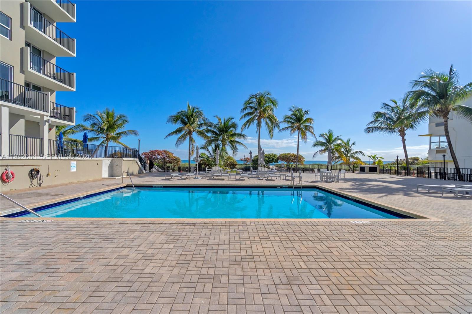 9273 Collins Avenue, Unit 503 Surfside, FL 33154 - Photo 31 of 48 a view of outdoor space with swimming pool