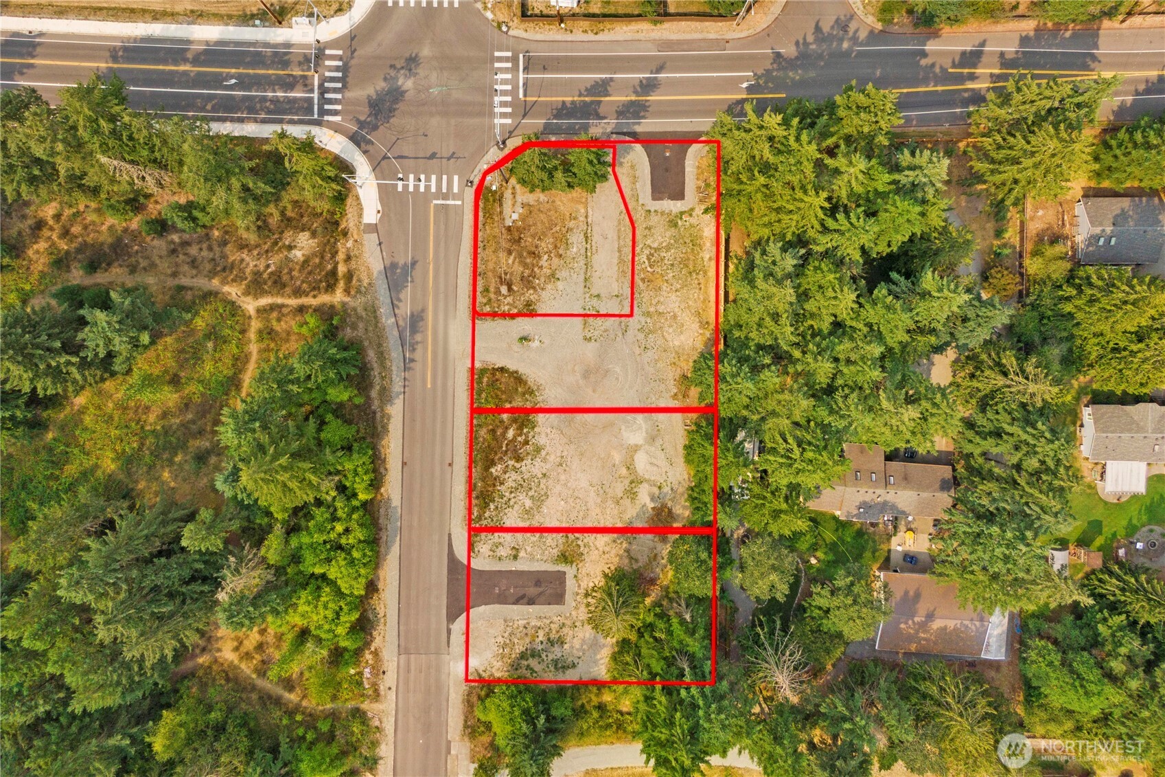20815 Canyon Road East Spanaway, WA 98387 - Photo 12 of 13 a view of entryway with a flower garden