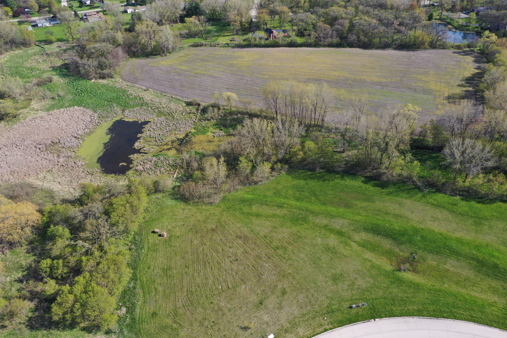 9618 Emily Lane Union, IL 60180 - Photo 4 of 16 a view of a lake with a yard and lake view