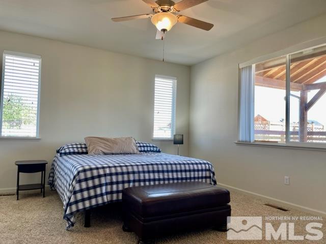 100 Wrangler Ranch Court Reno, NV 89510 - Photo 13 of 35 a bedroom with a bed and window