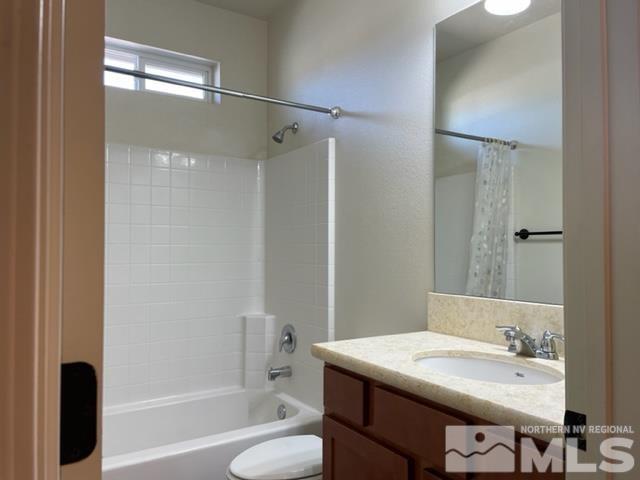100 Wrangler Ranch Court Reno, NV 89510 - Photo 19 of 35 a bathroom with a granite countertop sink toilet and shower