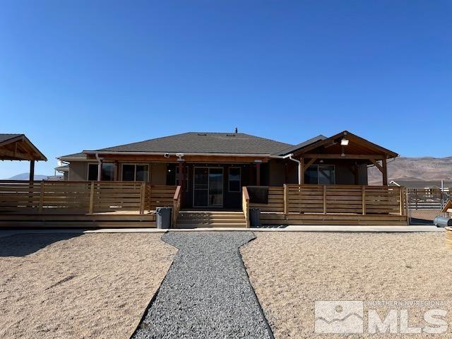 100 Wrangler Ranch Court Reno, NV 89510 - Photo 20 of 35 a front view of a house with a yard