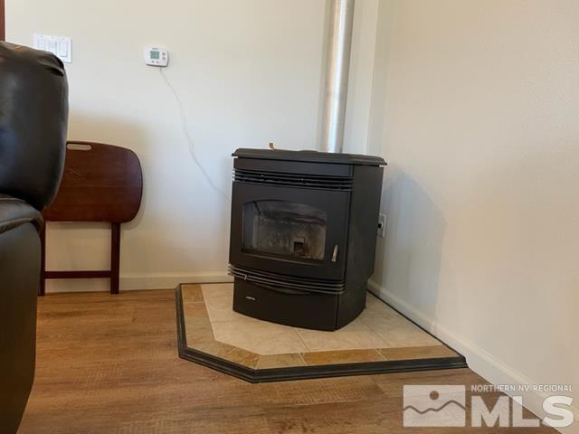 100 Wrangler Ranch Court Reno, NV 89510 - Photo 4 of 35 a living room with furniture and a fireplace