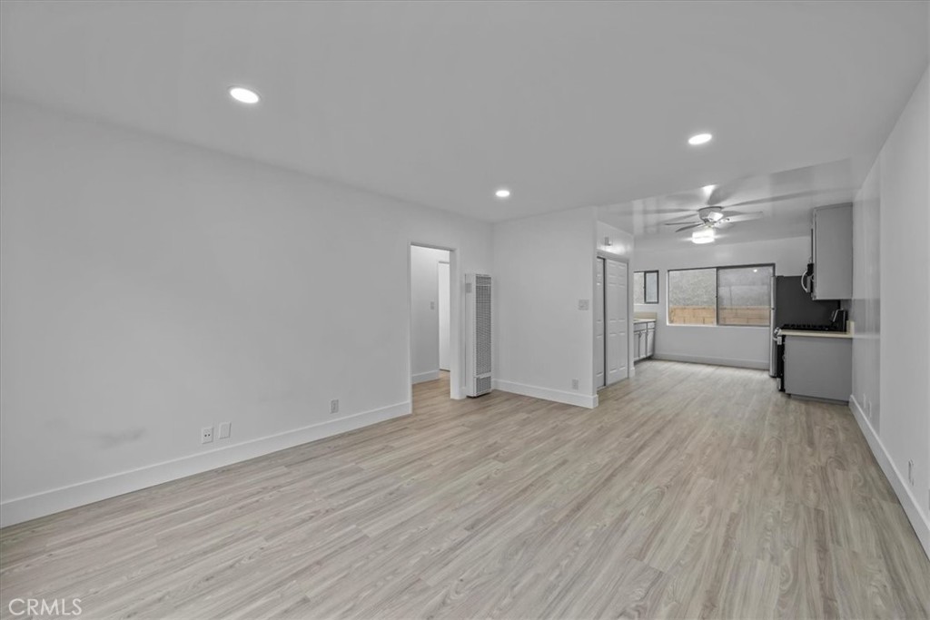 853 West 23rd Street, Unit 2 San Pedro, CA 90731 - Photo 6 of 19 a view of a big room with wooden floor and windows