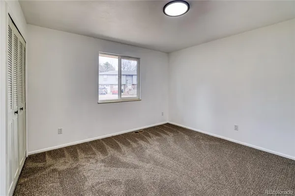 an empty room with a window