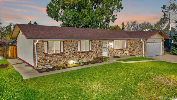 a view of backyard of a house