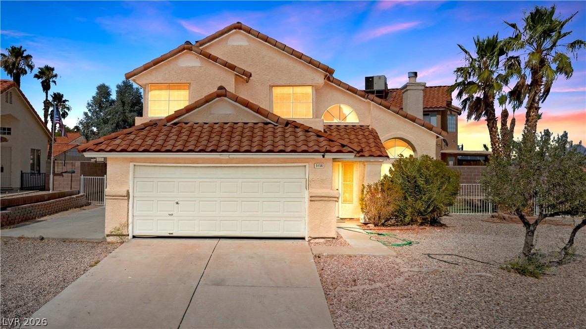 3156 Terrace View Drive Laughlin, NV 89029 - Photo 3 of 94 A charming two-story residence with a classic tile roof and an inviting front entry.