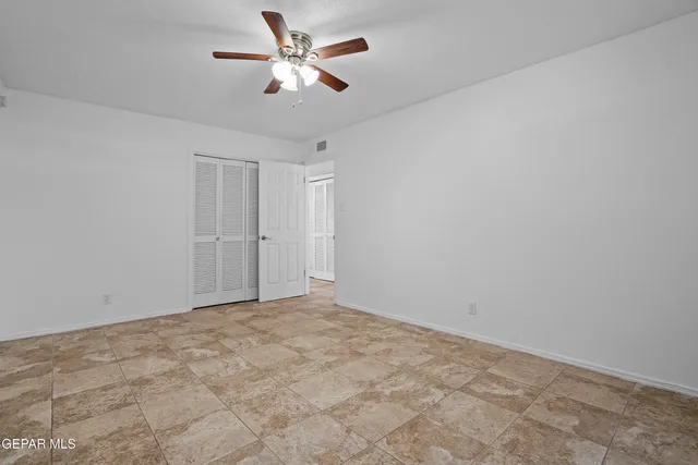 a spacious bathroom with a double vanity sink mirror and