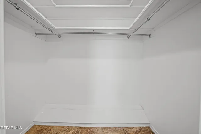 a bathroom with a toilet sink and shower