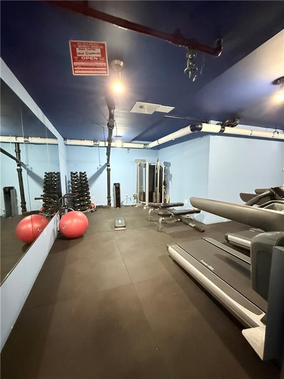 9511 Shore Road, Unit 617 Brooklyn, NY 11209 - Photo 12 of 14 a view of a room with gym equipment