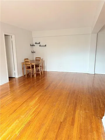 a bathroom with a sink a toilet and bathtub