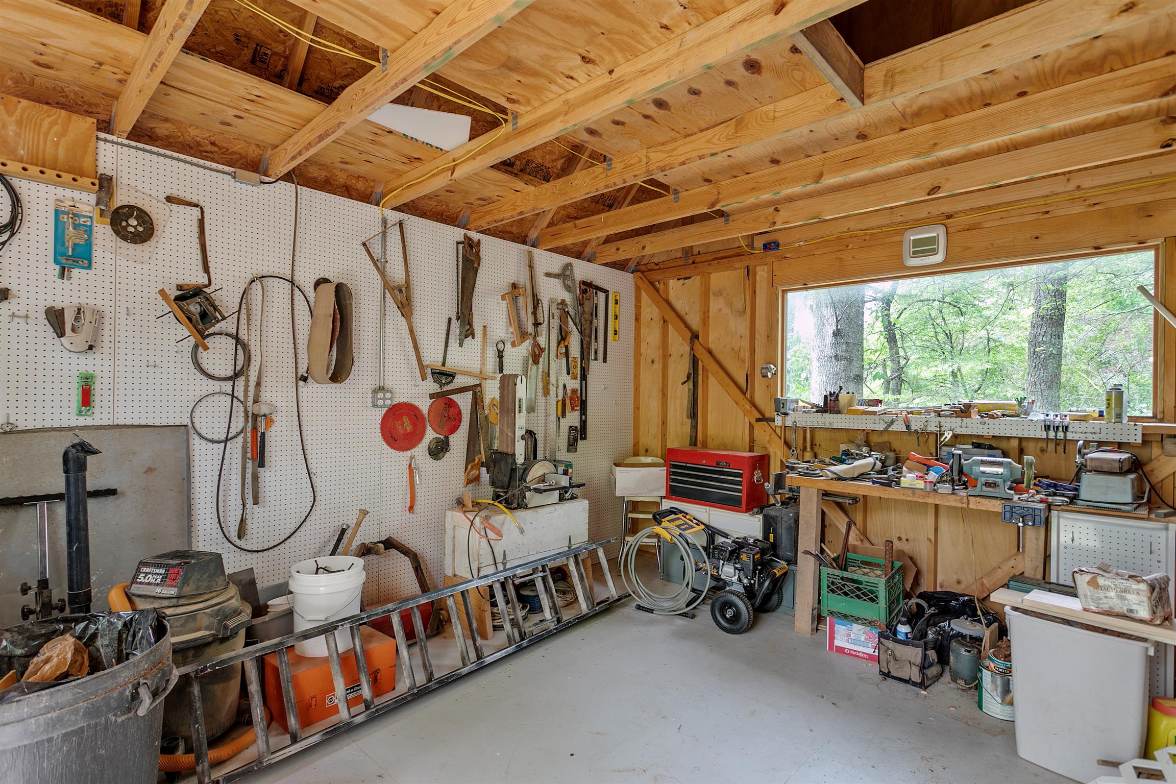 7315 Chester Road Fairview, TN 37062 - Photo 29 of 30 The workshop has a great picture window so you can watch the wildlife while you work