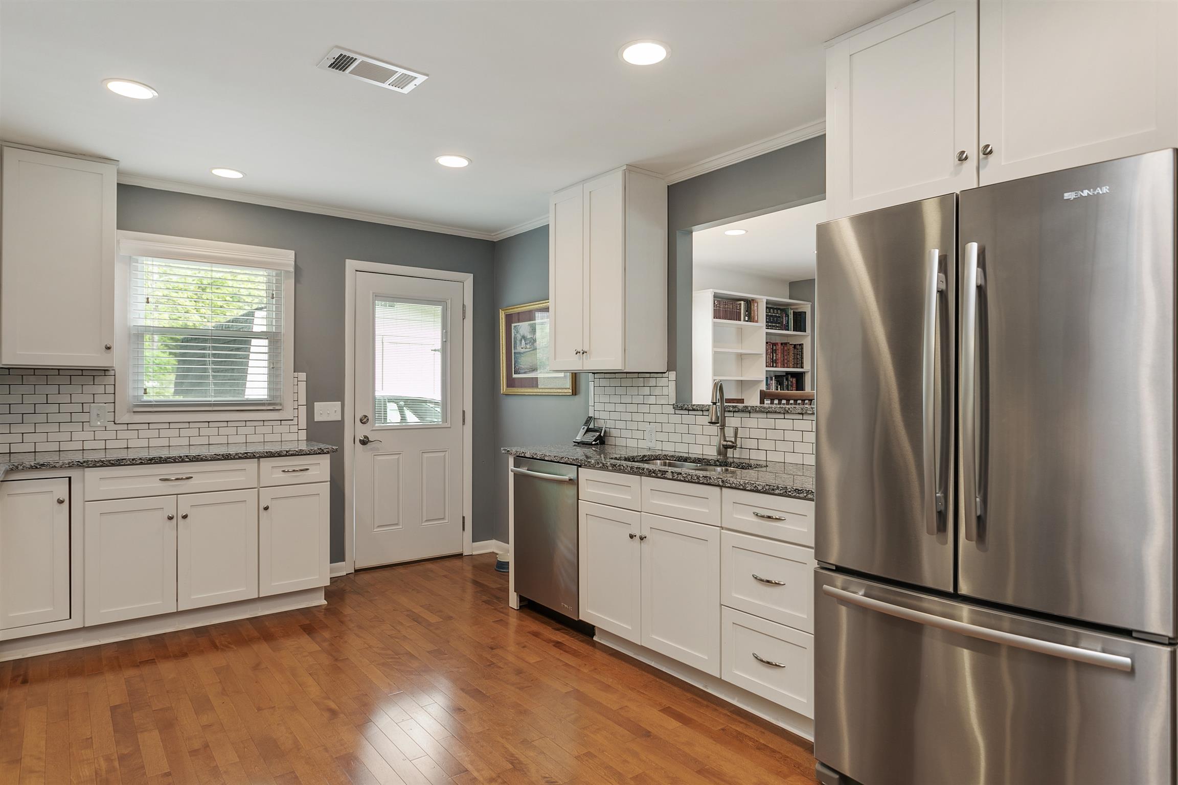 7315 Chester Road Fairview, TN 37062 - Photo 7 of 30 Remodeled kitchen with new cabinets, granite and tile backsplash
