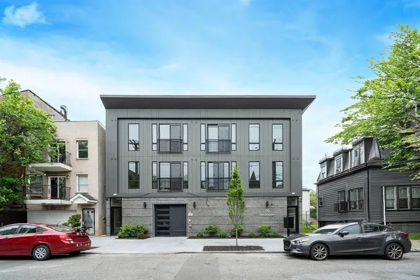 a car parked in front of a building