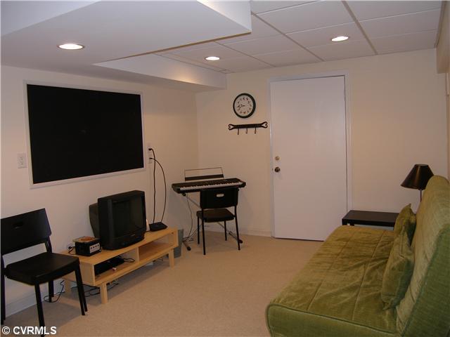 814 Watch Hill Road Midlothian, VA 23114 - Photo 12 of 12 Entertainment Room - Basement Meeting Room with Magnetic Board on Wall/Carpet/Recessed Lights/Door leading to Office/Storage Room