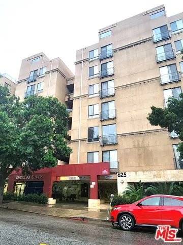 a cars parked in front of a building