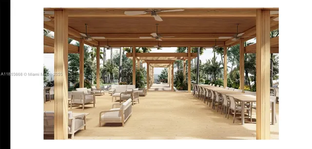 a view of a patio with table and chairs and potted plants