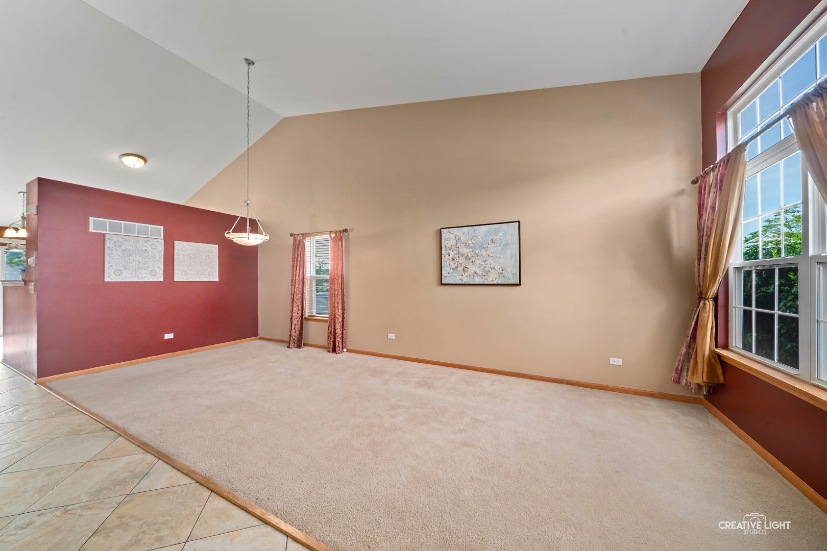 2113 Beldon Court Plainfield, IL 60586 - Photo 2 of 25 a view of an empty room with a window