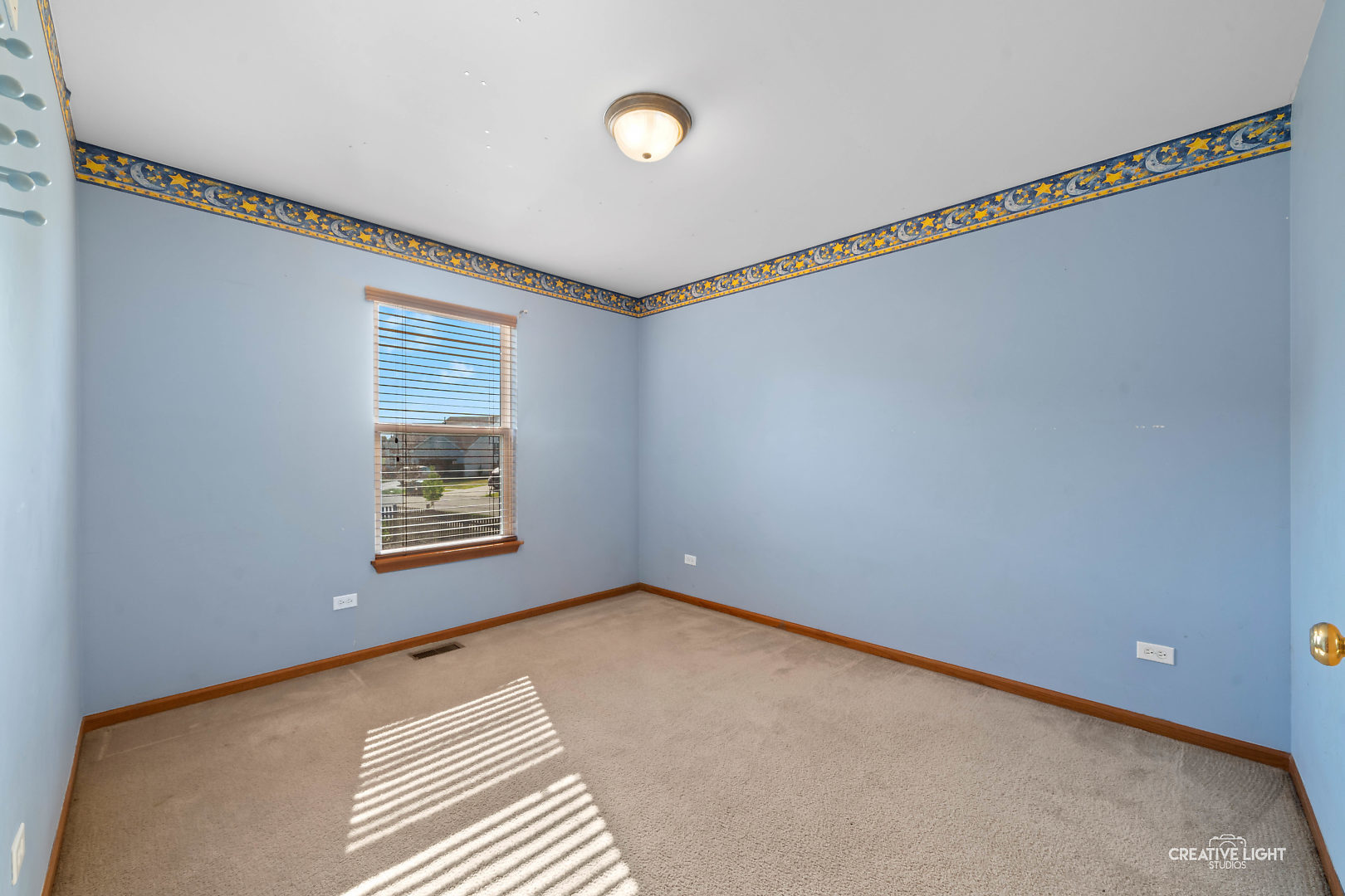 2113 Beldon Court Plainfield, IL 60586 - Photo 11 of 25 a view of an empty room with a window