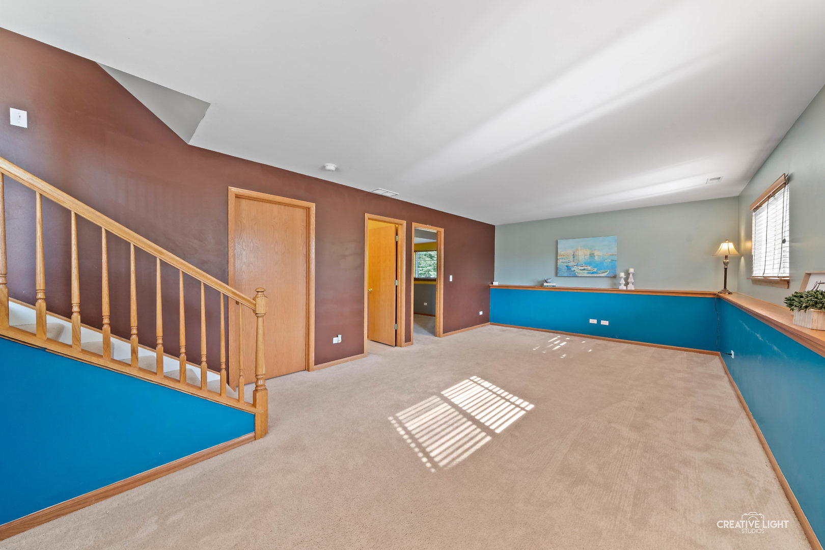 2113 Beldon Court Plainfield, IL 60586 - Photo 15 of 25 a view of an empty room with window and stairs