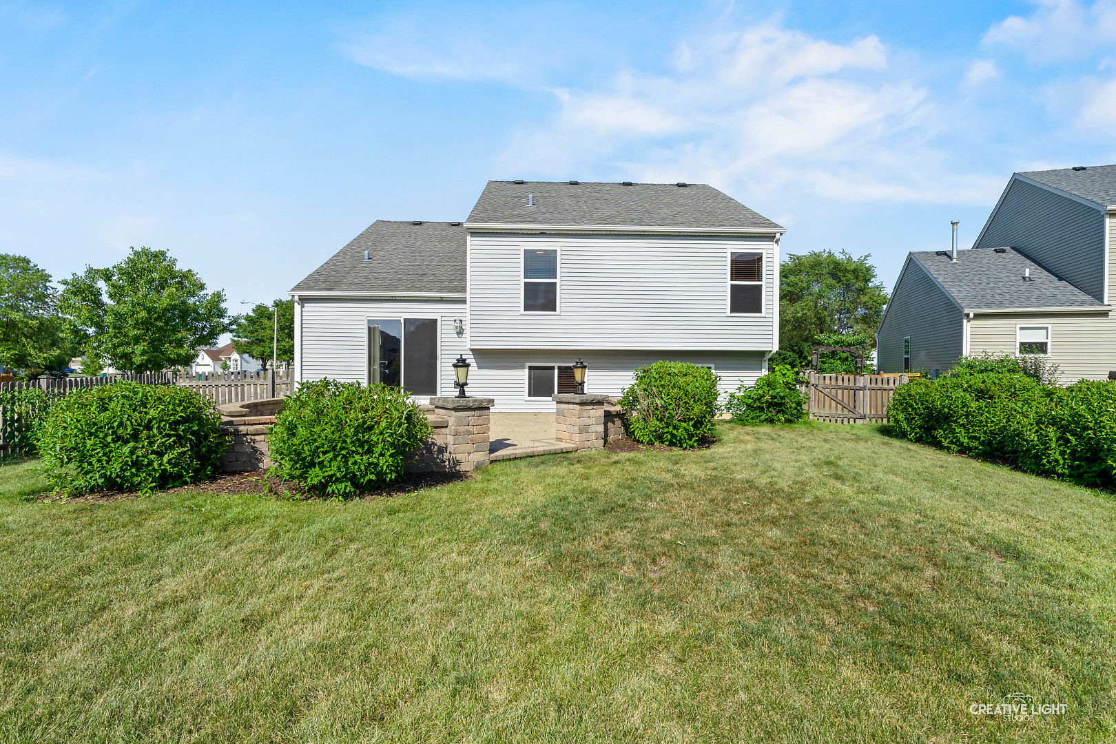 2113 Beldon Court Plainfield, IL 60586 - Photo 21 of 25 a front view of a house with a yard