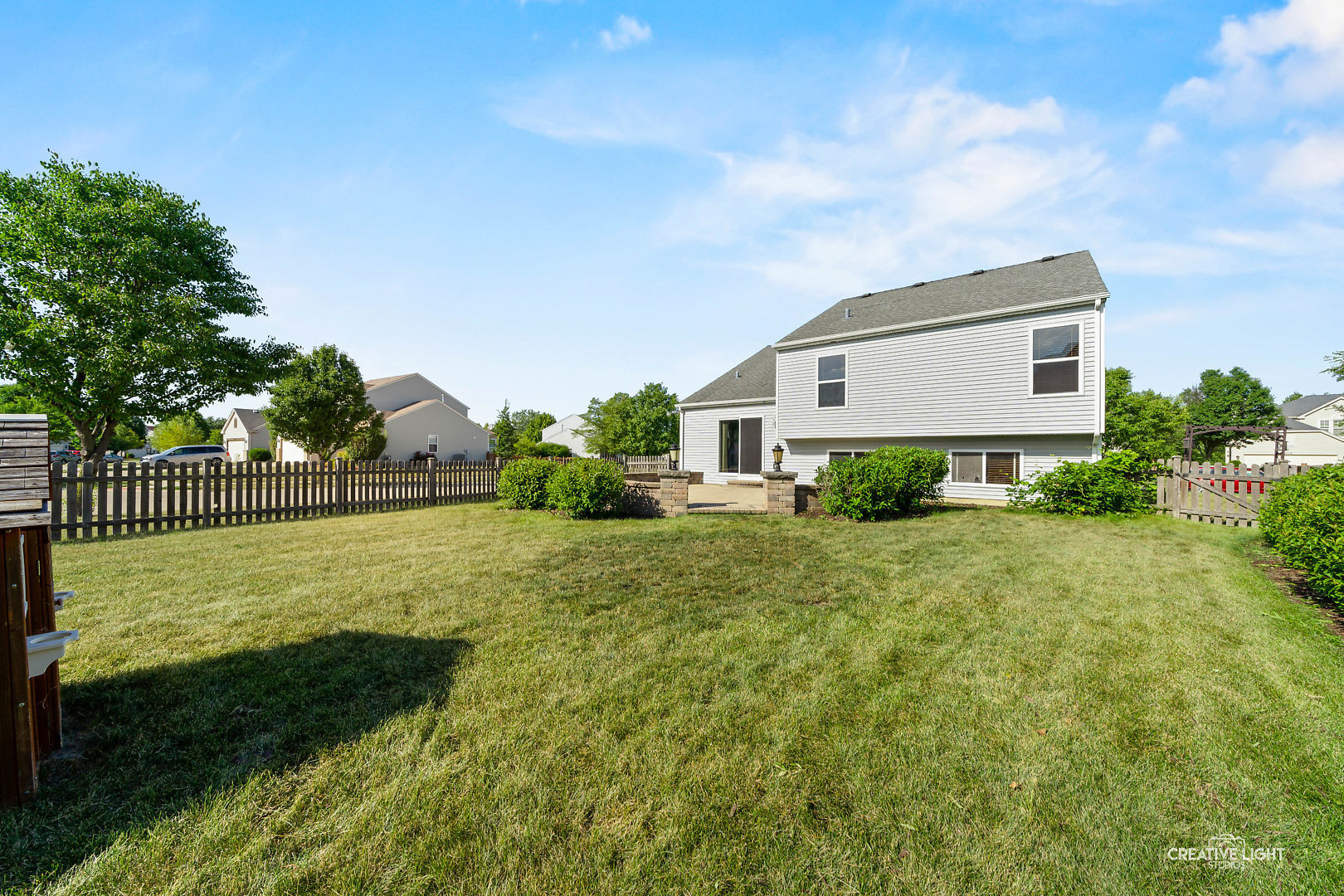 2113 Beldon Court Plainfield, IL 60586 - Photo 22 of 25 a front view of a house with garden