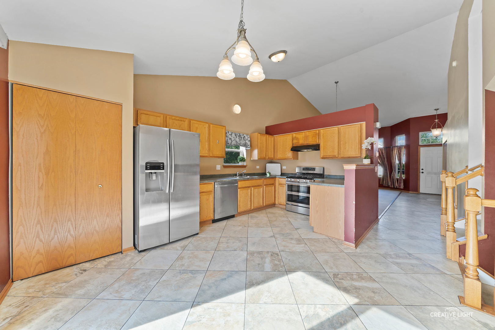 2113 Beldon Court Plainfield, IL 60586 - Photo 4 of 25 a kitchen with stainless steel appliances granite countertop a refrigerator a oven a sink and a refrigerator
