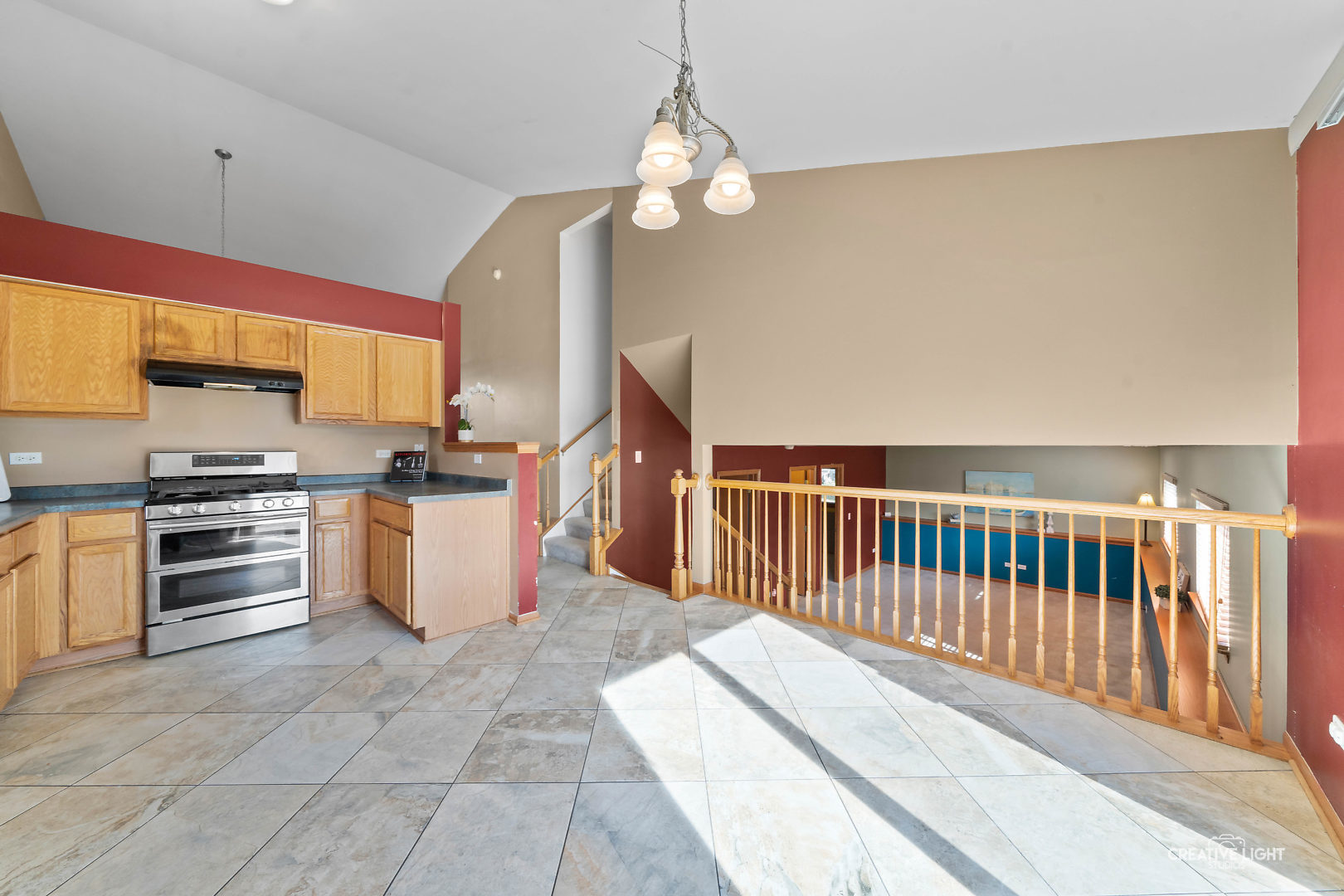 2113 Beldon Court Plainfield, IL 60586 - Photo 6 of 25 a kitchen with stainless steel appliances granite countertop a stove a sink and a refrigerator