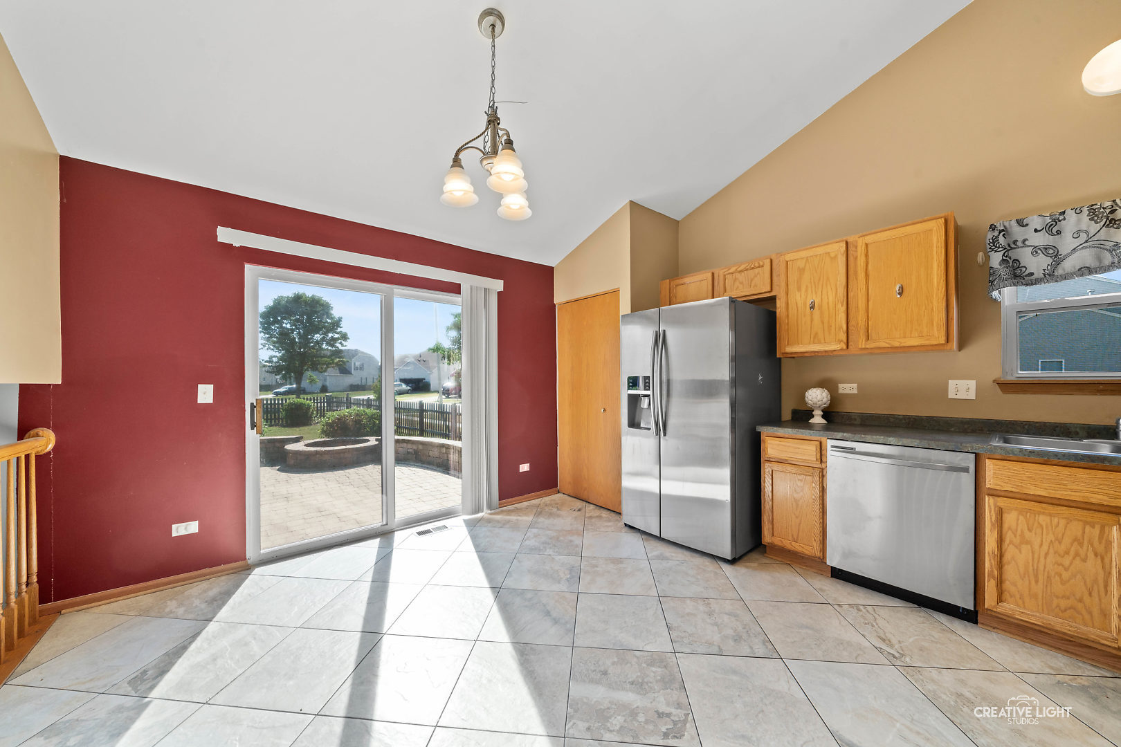 2113 Beldon Court Plainfield, IL 60586 - Photo 7 of 25 a kitchen with stainless steel appliances granite countertop a refrigerator and a sink