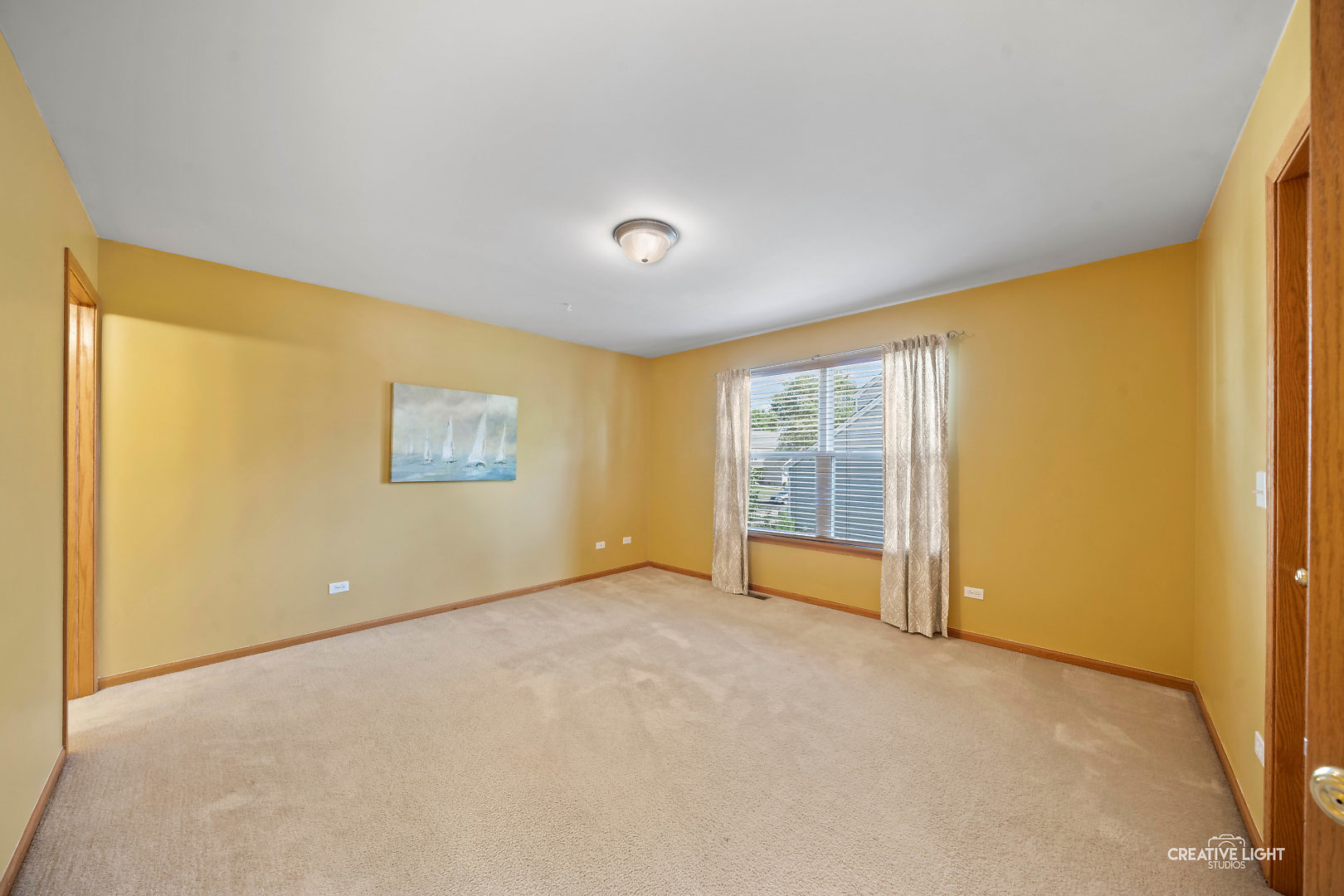 2113 Beldon Court Plainfield, IL 60586 - Photo 8 of 25 a view of an empty room with a window