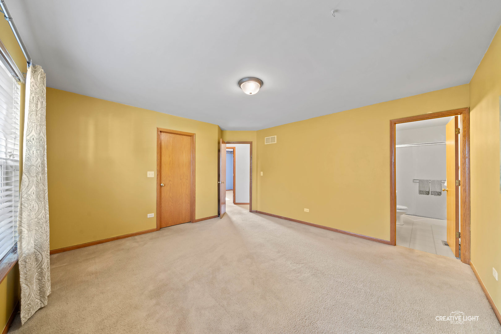 2113 Beldon Court Plainfield, IL 60586 - Photo 9 of 25 a view of an empty room with a window