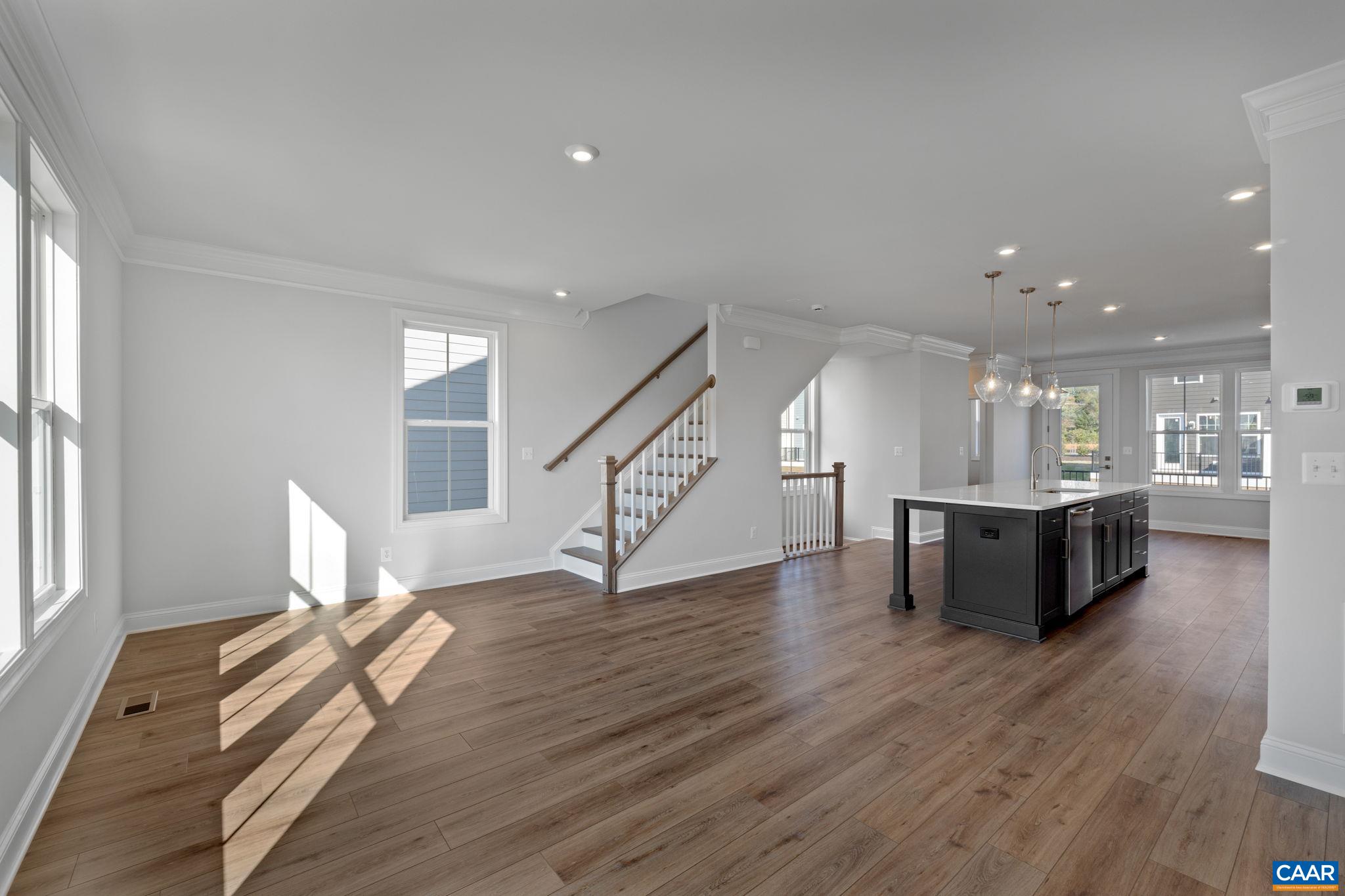 7 Ryan Way Charlottesville, VA 22911 - Photo 19 of 36 a living room with furniture wooden floor and a large window