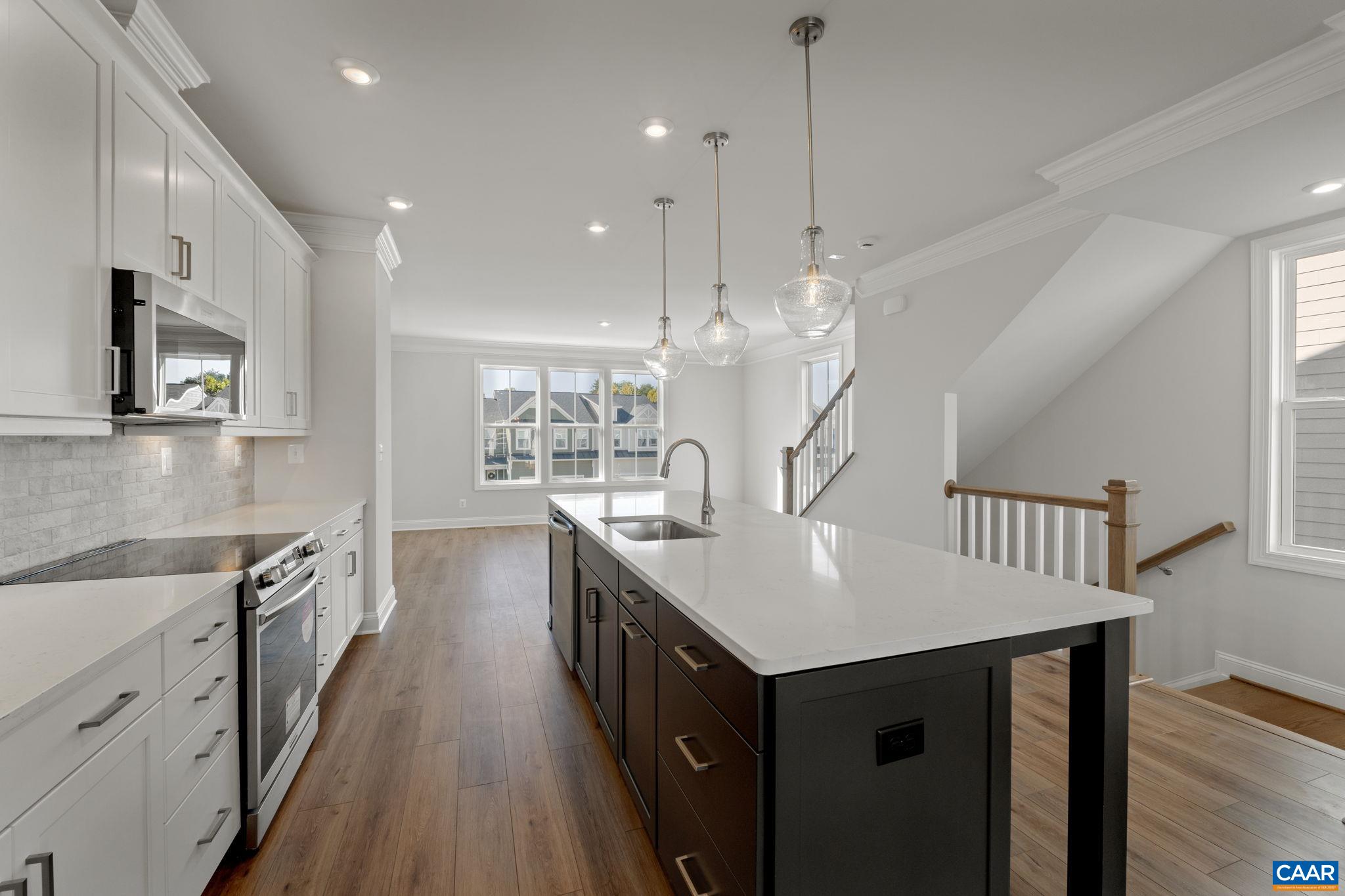 7 Ryan Way Charlottesville, VA 22911 - Photo 7 of 36 a kitchen with counter top space and wooden floor