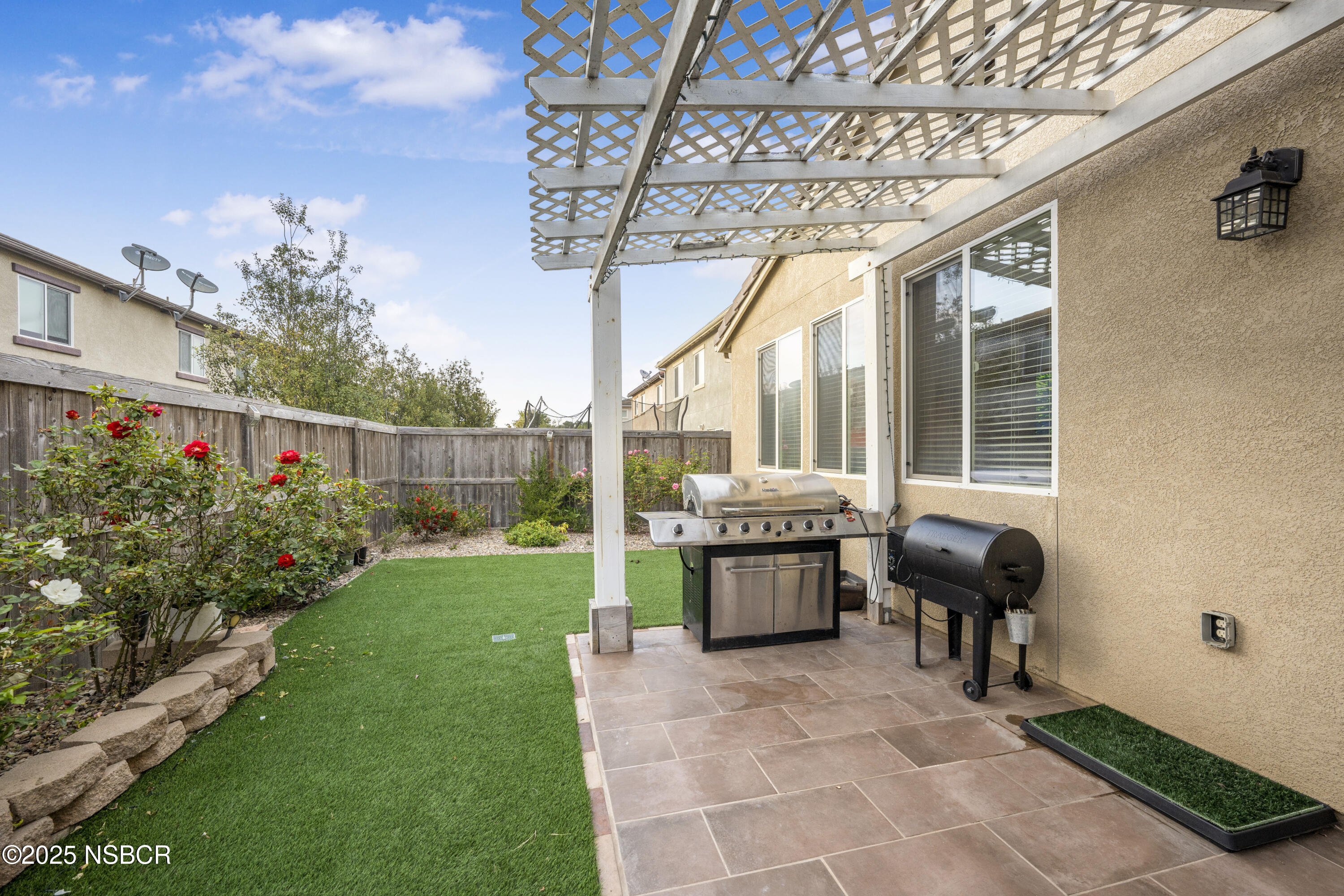 1033 Conception Drive Lompoc, CA 93436 - Photo 17 of 18 a view of an house with backyard porch and sitting area