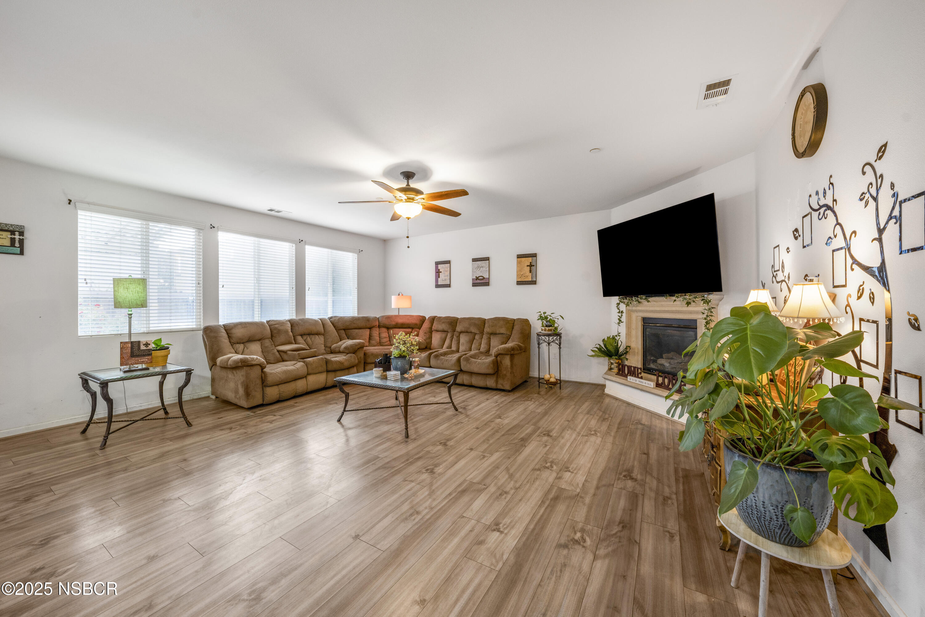 1033 Conception Drive Lompoc, CA 93436 - Photo 8 of 18 a living room with furniture and a flat screen tv