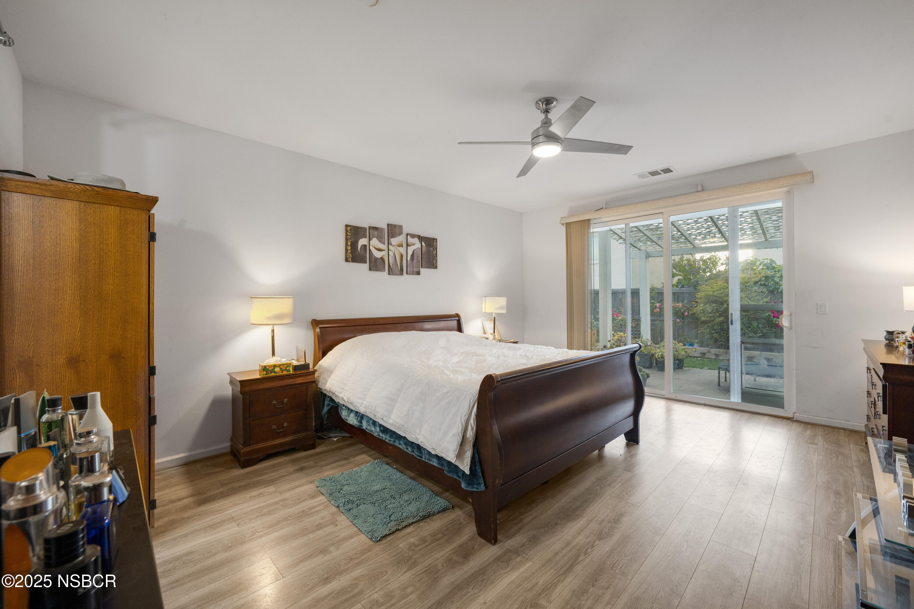 1033 Conception Drive Lompoc, CA 93436 - Photo 10 of 18 a spacious bedroom with a bed and a large window