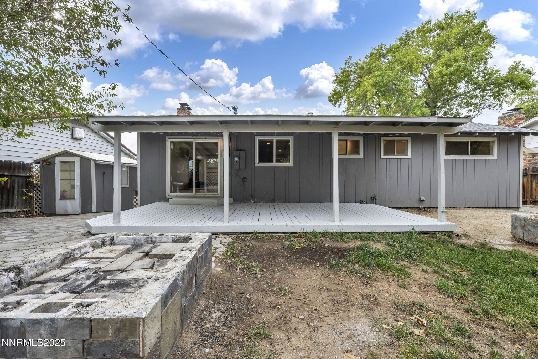 1735 Carlin Street Reno, NV 89503 - Photo 12 of 73 a view of a house with a yard and large tree