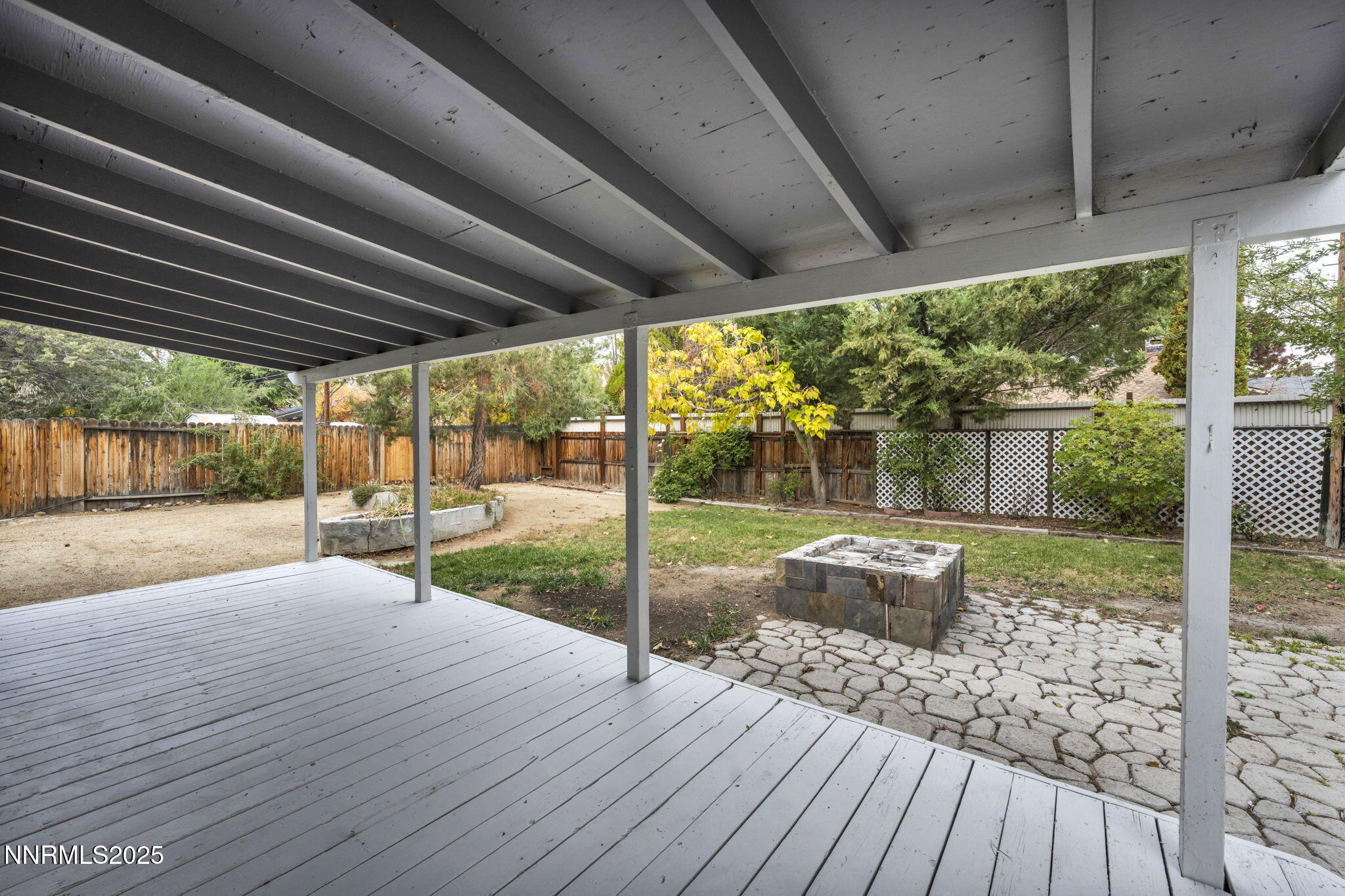 1735 Carlin Street Reno, NV 89503 - Photo 14 of 73 a view of a house with backyard and porch