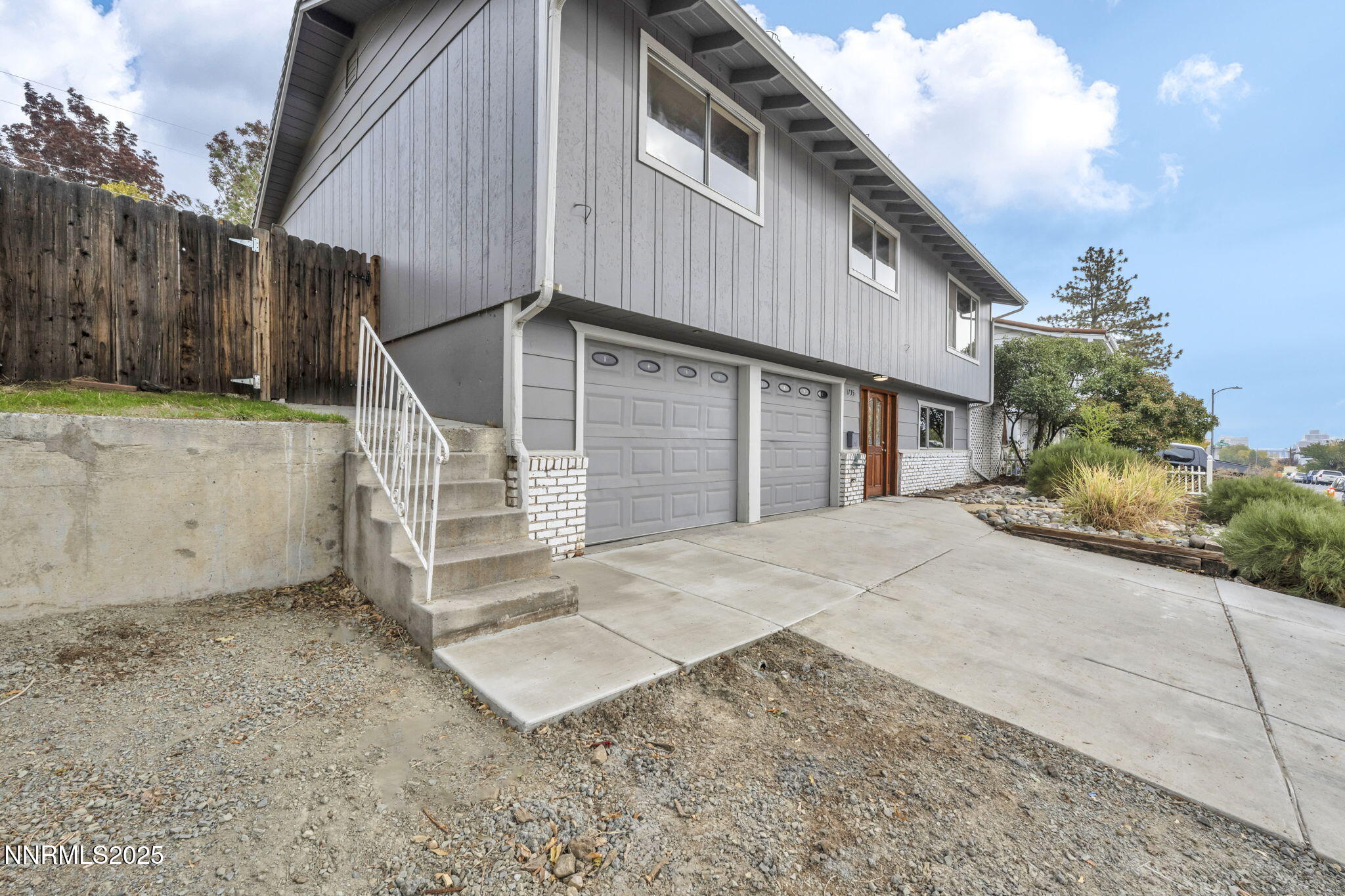 1735 Carlin Street Reno, NV 89503 - Photo 2 of 73 a front view of a house with a yard
