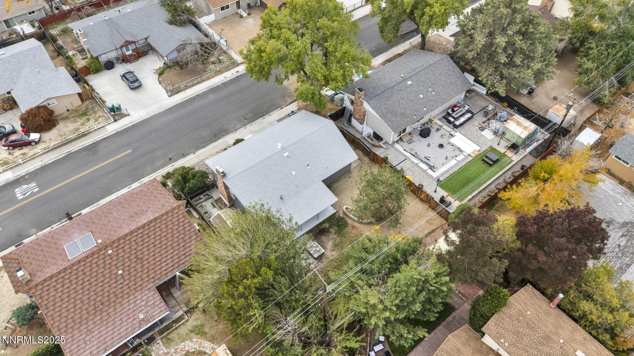 1735 Carlin Street Reno, NV 89503 - Photo 23 of 73 an aerial view of a house with a yard and trees
