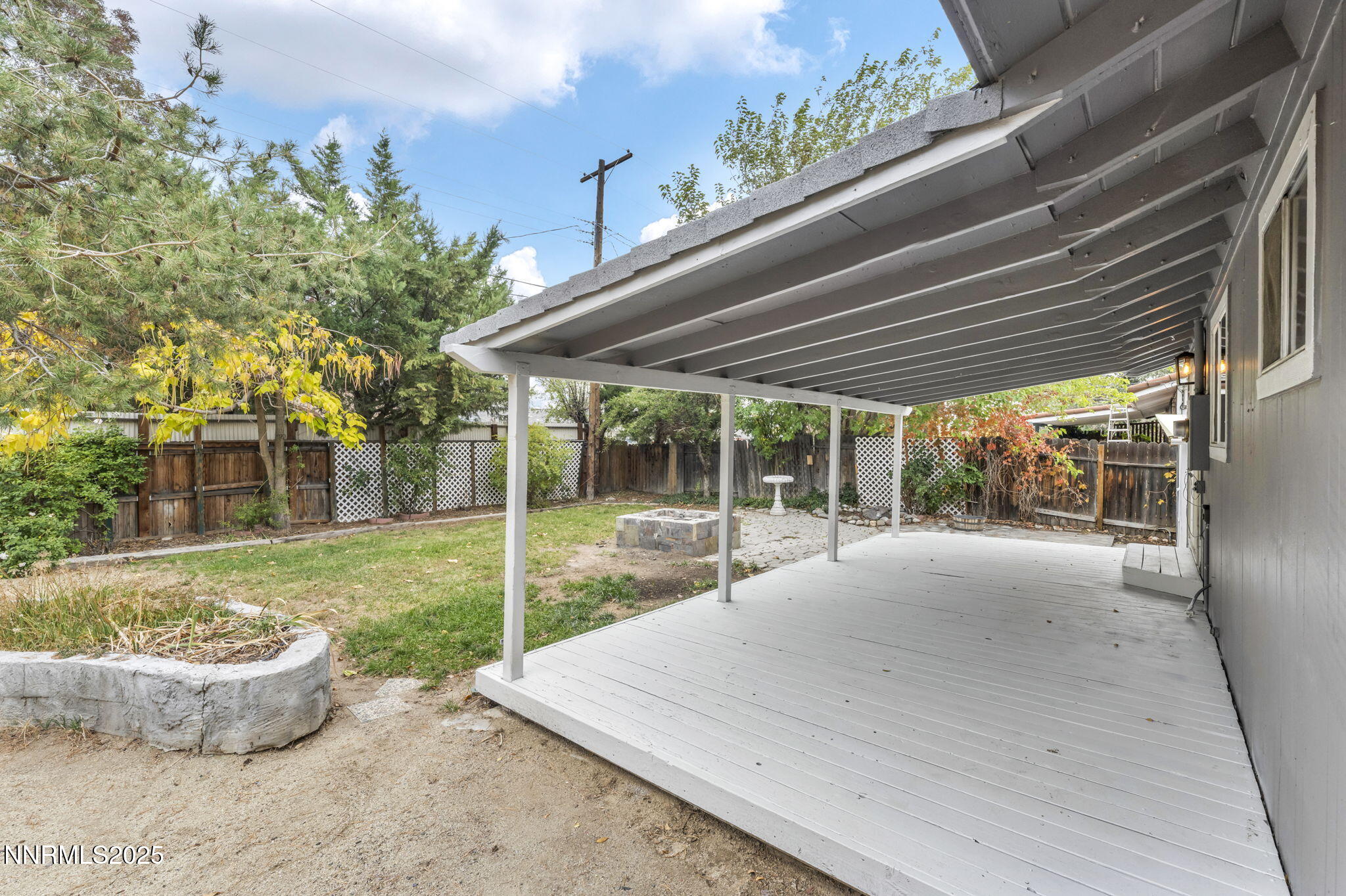 1735 Carlin Street Reno, NV 89503 - Photo 5 of 73 a view of a house with backyard and porch