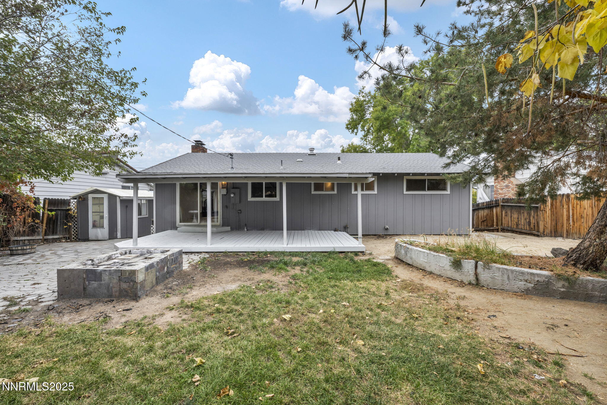 1735 Carlin Street Reno, NV 89503 - Photo 69 of 73 a view of a house with backyard and sitting area