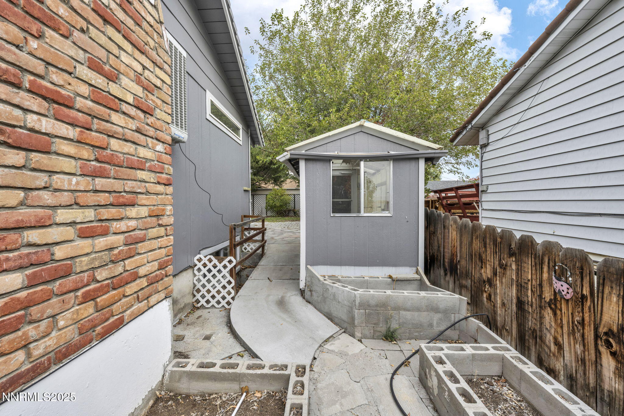 1735 Carlin Street Reno, NV 89503 - Photo 8 of 73 a backyard of a house with table and chairs