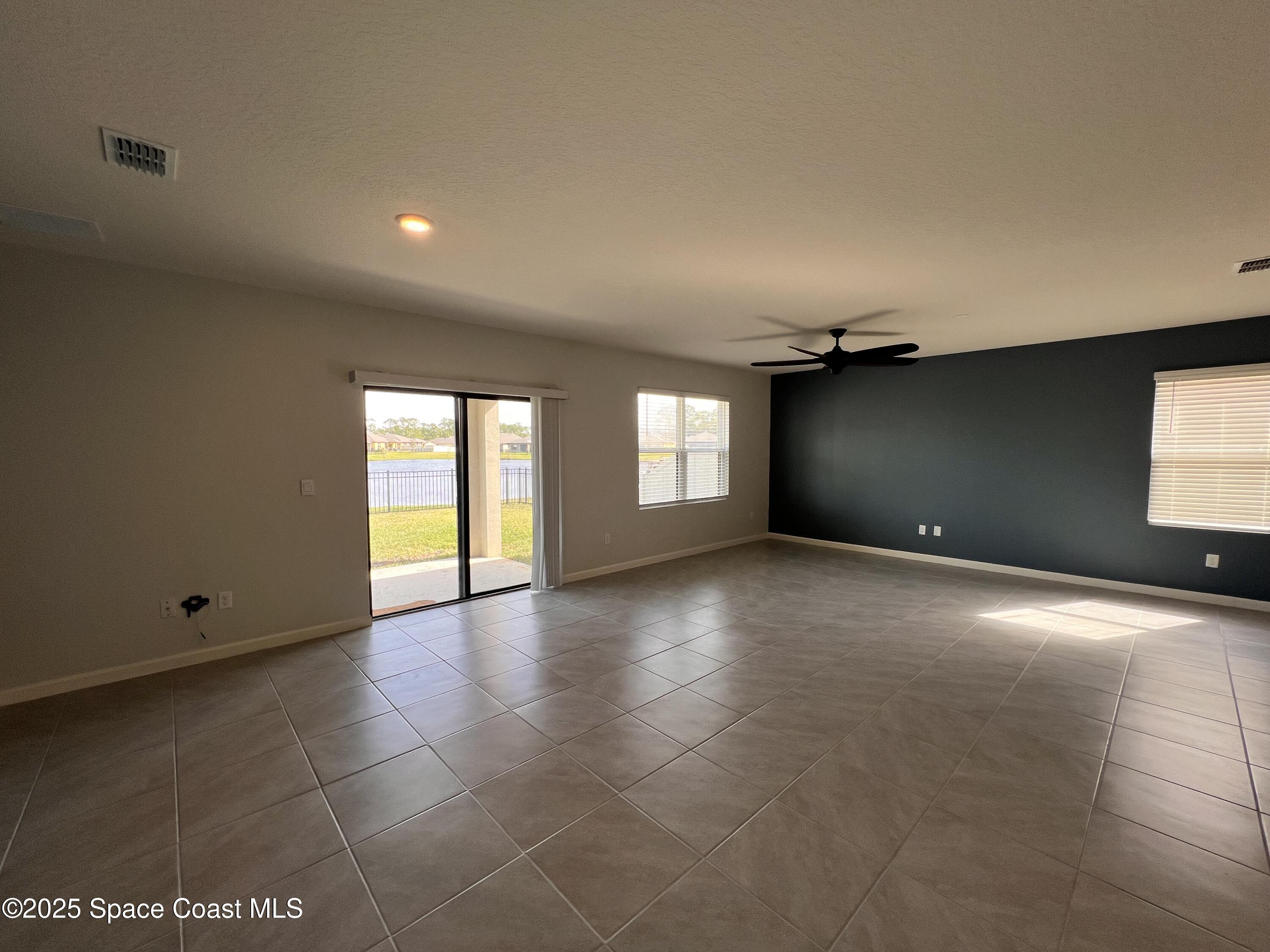 4871 Talbot Boulevard Cocoa, FL 32926 - Photo 19 of 25 a view of empty room with window