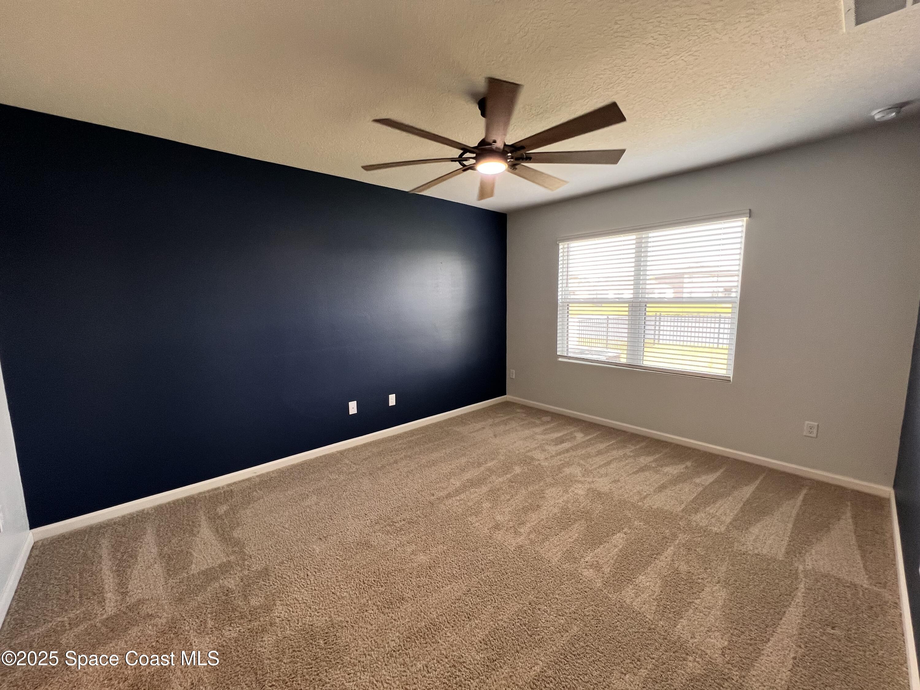 4871 Talbot Boulevard Cocoa, FL 32926 - Photo 20 of 25 a view of an empty room with a window