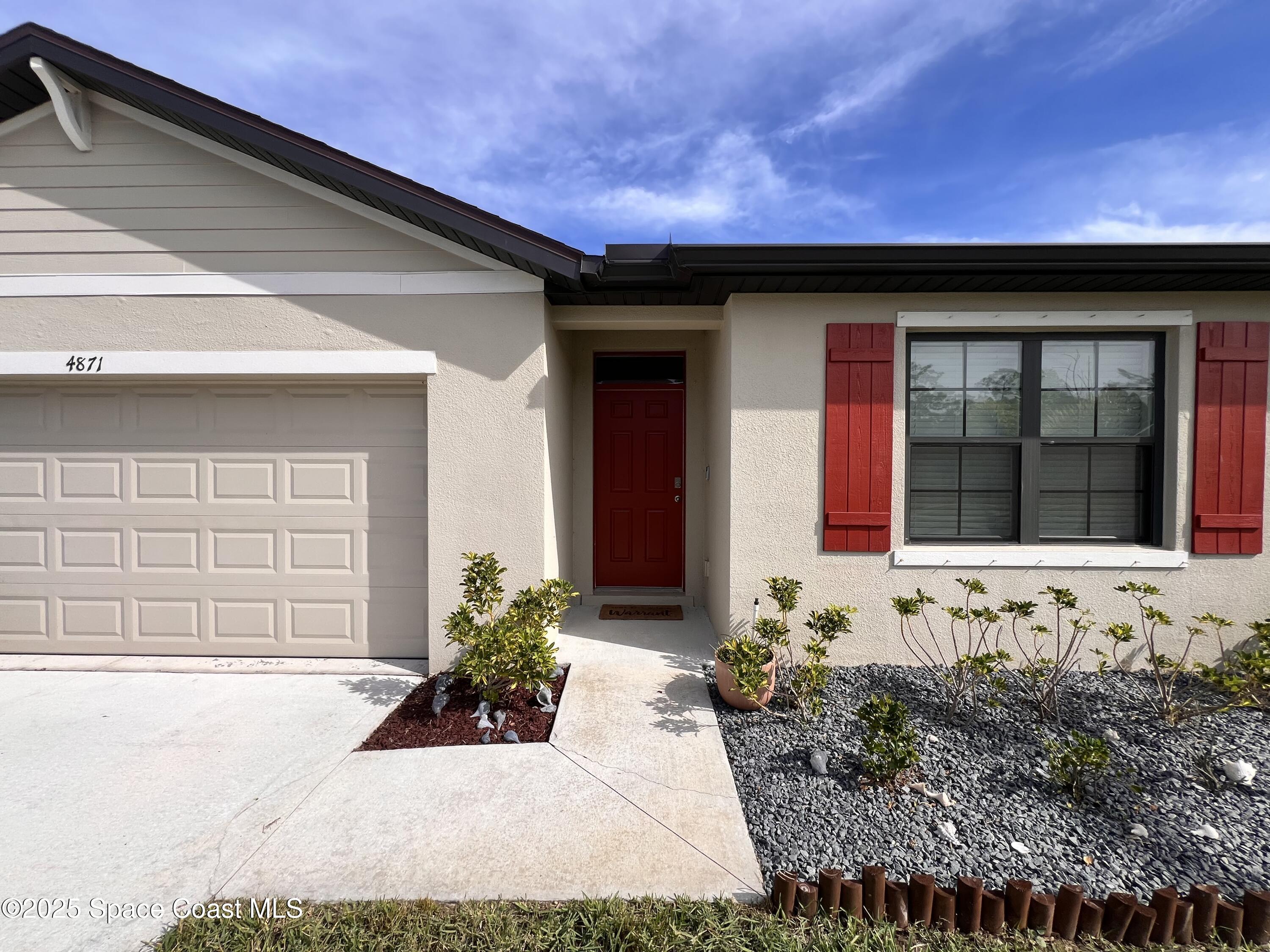 4871 Talbot Boulevard Cocoa, FL 32926 - Photo 2 of 25 a front view of a house