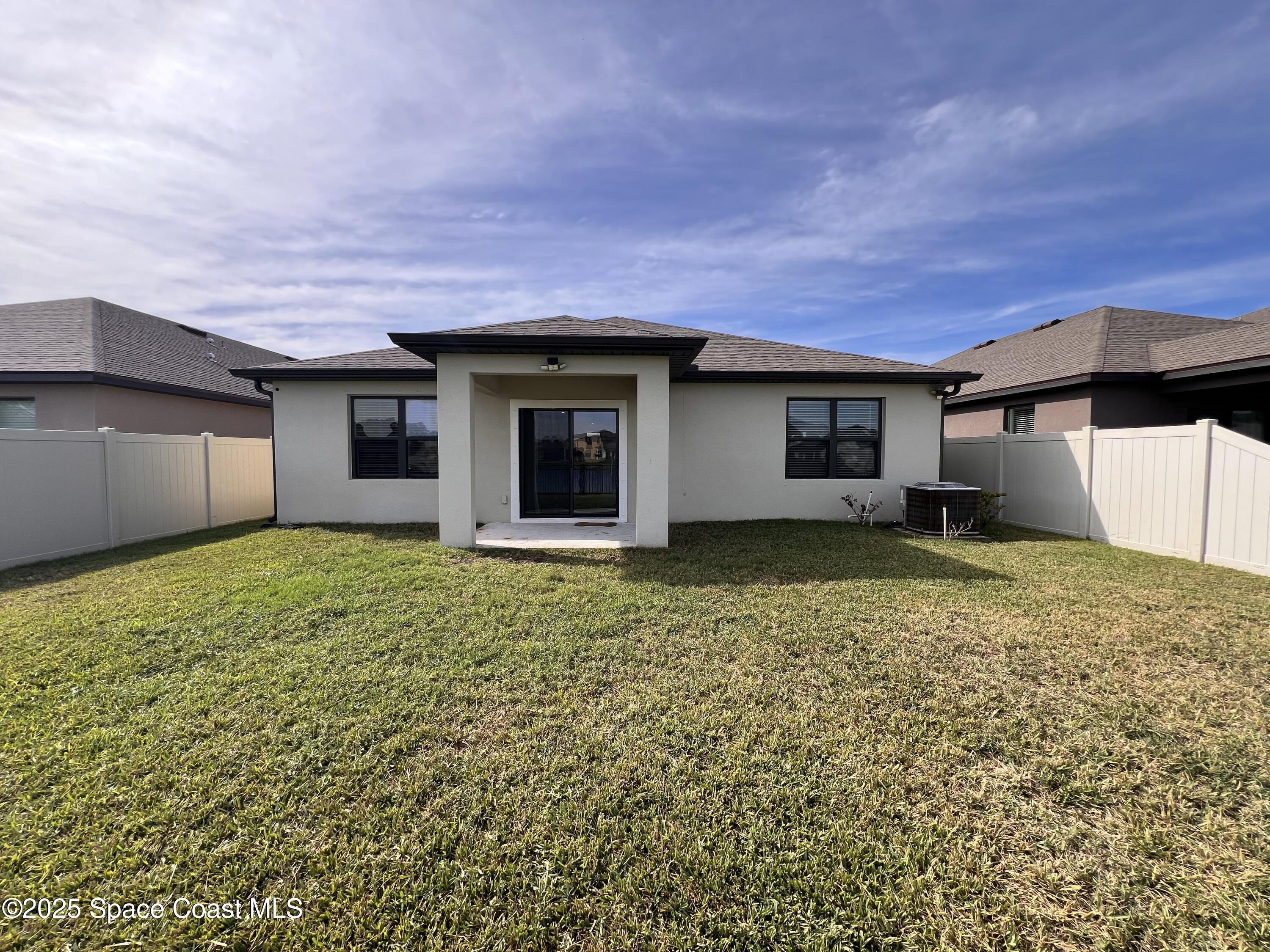 4871 Talbot Boulevard Cocoa, FL 32926 - Photo 24 of 25 a view of a house with a yard